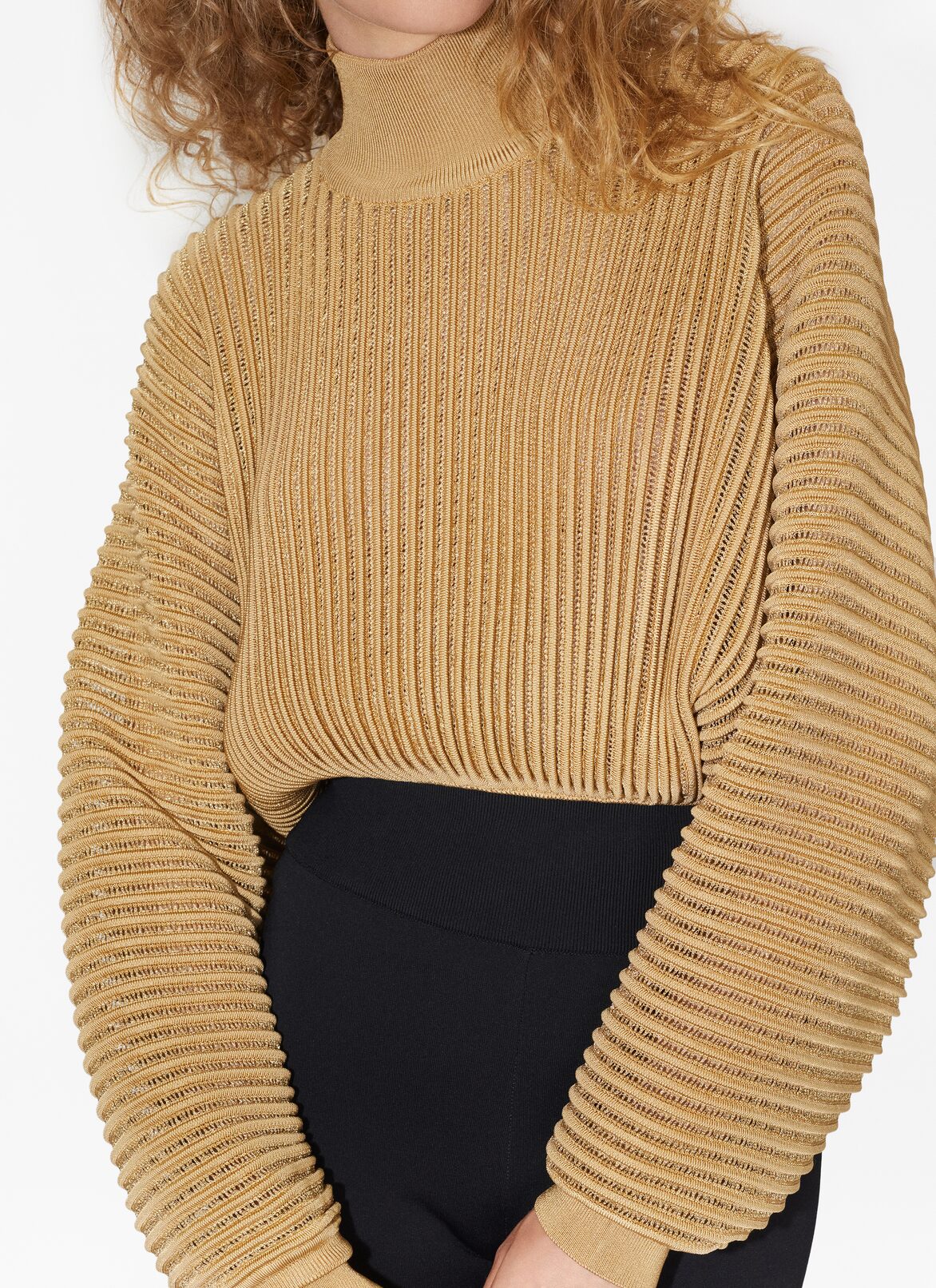 Pull en lurex côtelé  ALAÏA PULL EN LUREX CÔTELÉ  OR